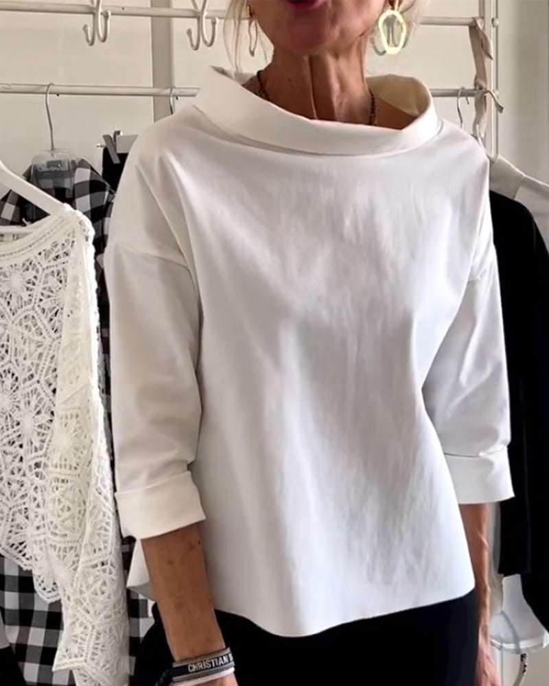 Top a rete bianco con rever – Eleganza senza tempo ridefinita