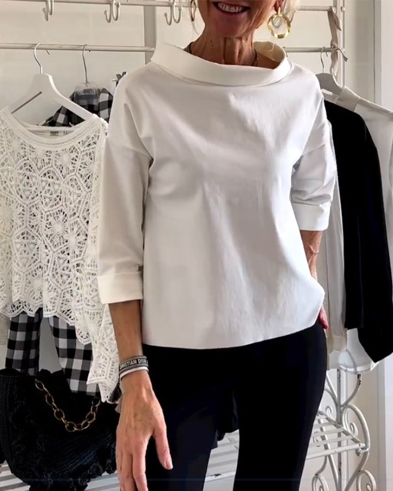 Top a rete bianco con rever – Eleganza senza tempo ridefinita