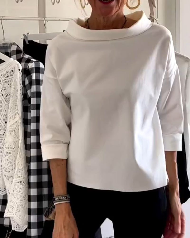 Top a rete bianco con rever – Eleganza senza tempo ridefinita
