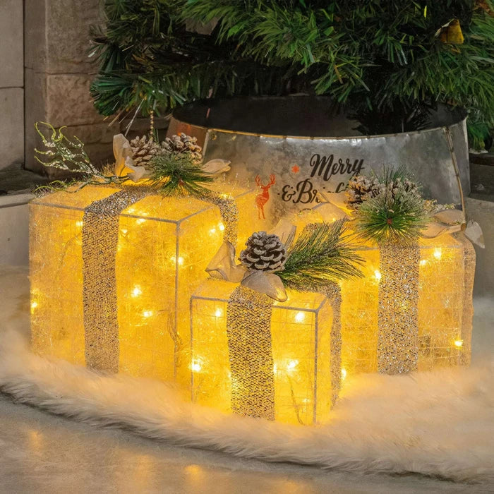 Leuchtende Weihnachtsgeschenkboxen – Set mit Tannenzapfen und Grün