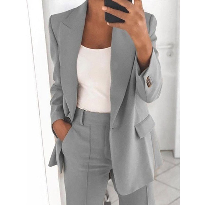 Dame-to-delt sæt med blazer og bukser – Elegant til kontor og hverdag