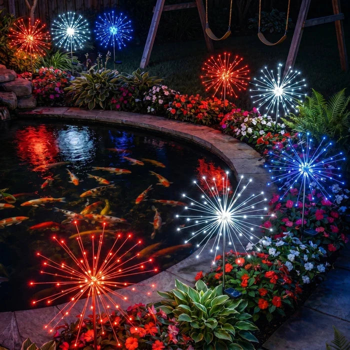 Solarleuchten mit Erdspiess – funkelndes Licht in Rot, Weiss und Blau am Weg