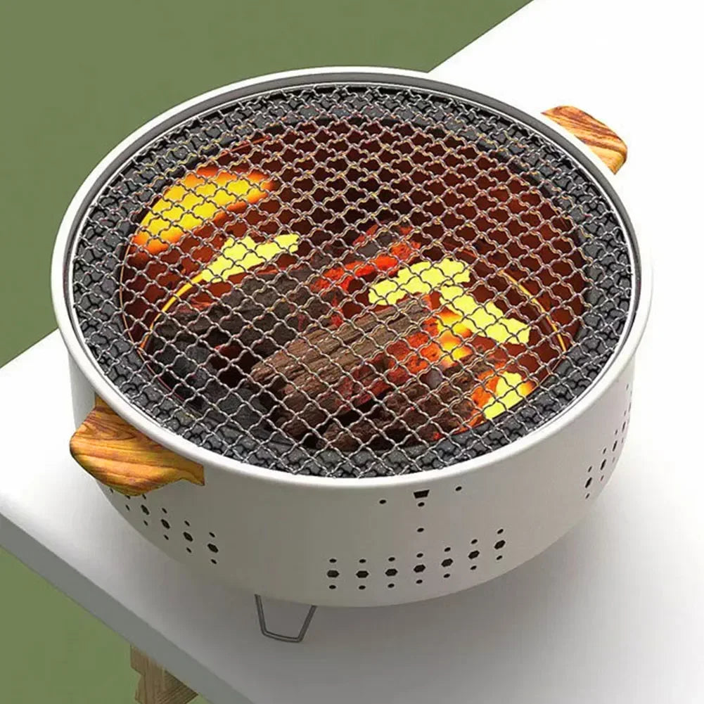 Tragbarer Holzkohlegrill aus Edelstahl und Gusseisen für Camping und Outdoor, kompakt und vielseitig 0