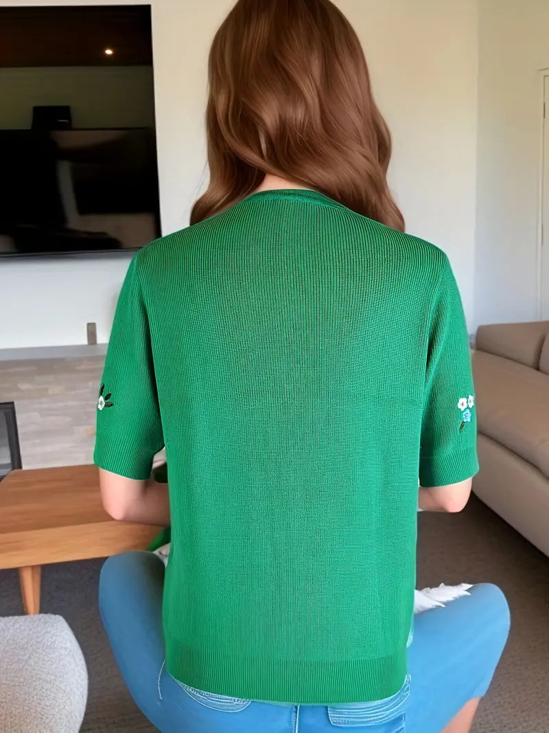 Rita - Maglione con motivo floreale e chiusura con bottoni per un look elegante