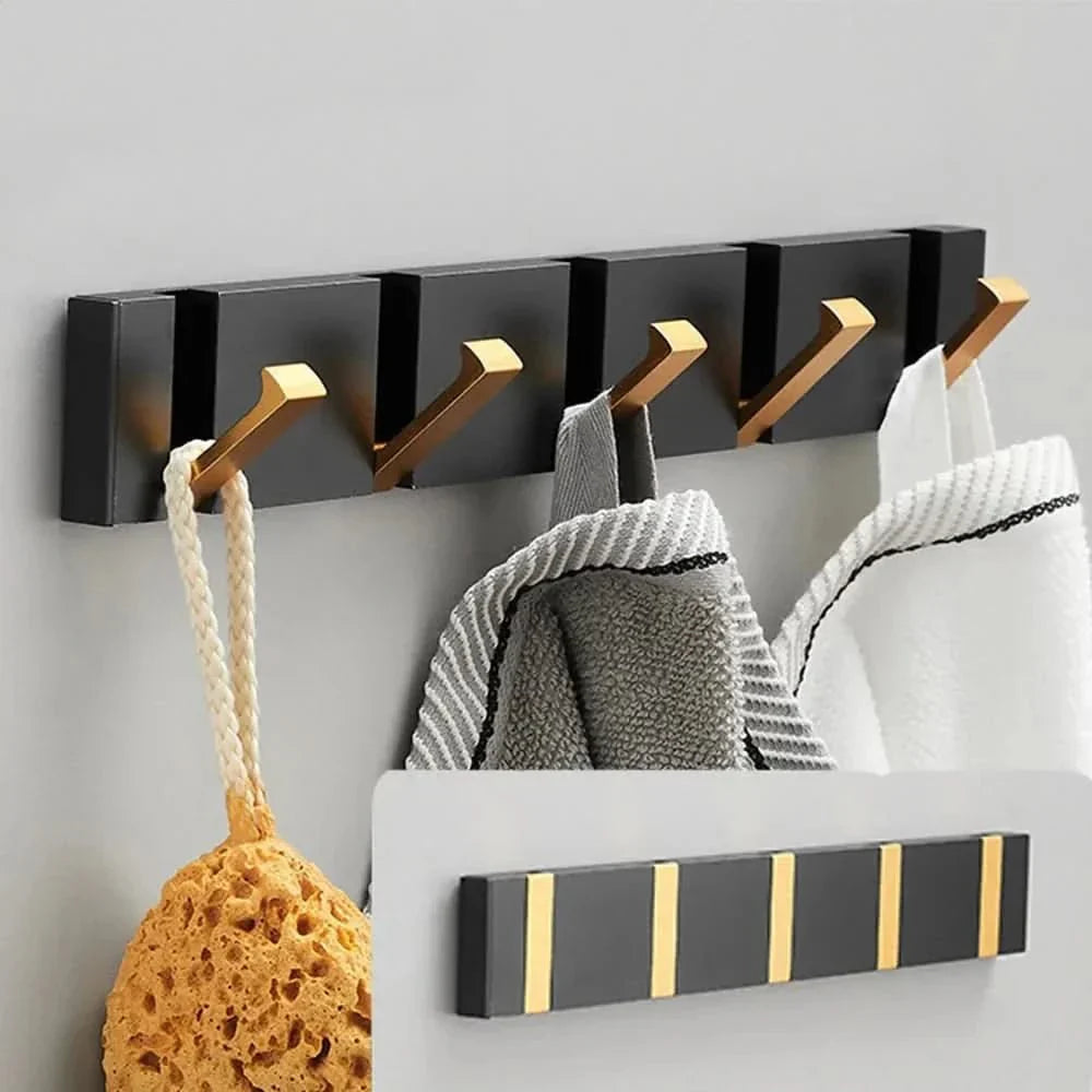 Ganci da parete – Design pieghevole, metallo robusto e montaggio salvaspazio