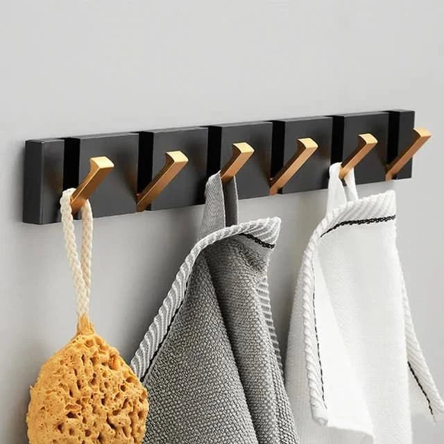 Ganci da parete – Design pieghevole, metallo robusto e montaggio salvaspazio