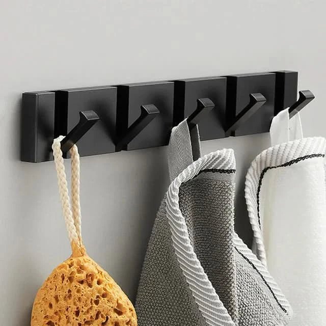 Ganci da parete – Design pieghevole, metallo robusto e montaggio salvaspazio
