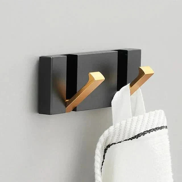 Ganci da parete – Design pieghevole, metallo robusto e montaggio salvaspazio