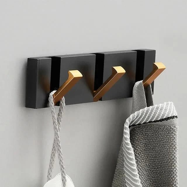 Ganci da parete – Design pieghevole, metallo robusto e montaggio salvaspazio