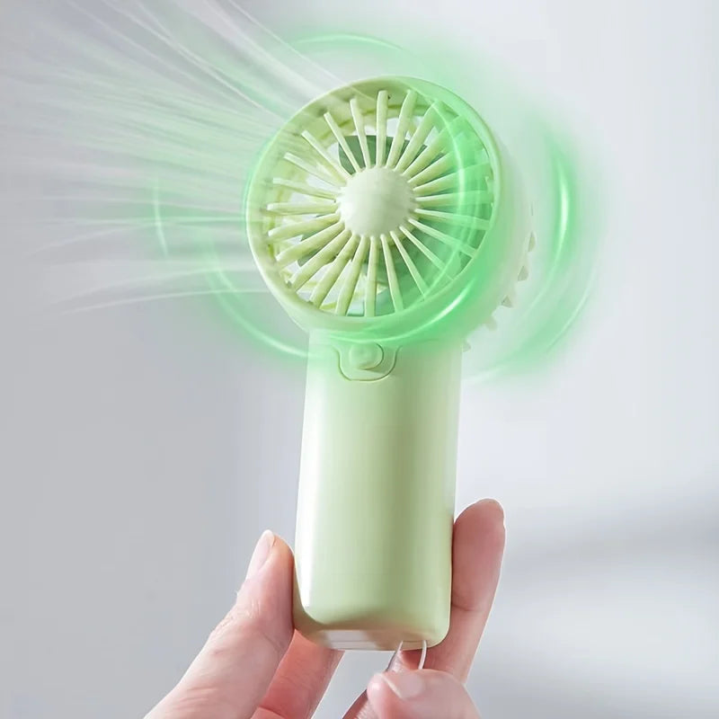 Mini-větrný zázrak – Přenosný ventilátor pro svěžest na cestách